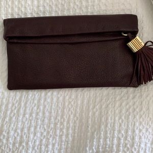 India Hicks leather clutch